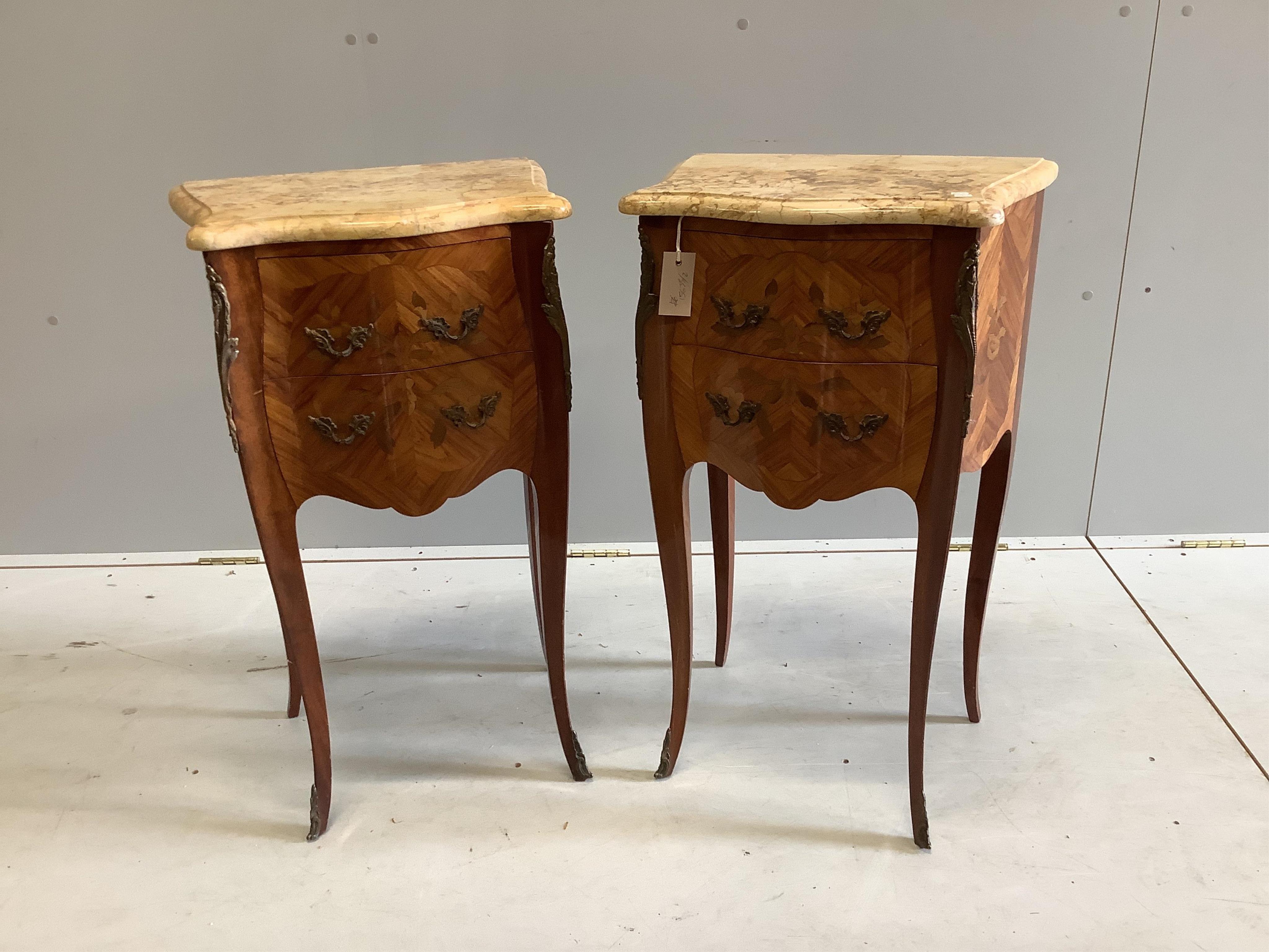 A pair of Louis XVI style marquetry inlaid gilt metal mounted kingwood marble top bedside cabinets, width 45cm, depth 32cm, height 75cm. Condition - good